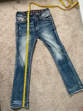SOLD! Rock Revival Faded Blue boot cut Jeans with Distressing - very stretchy